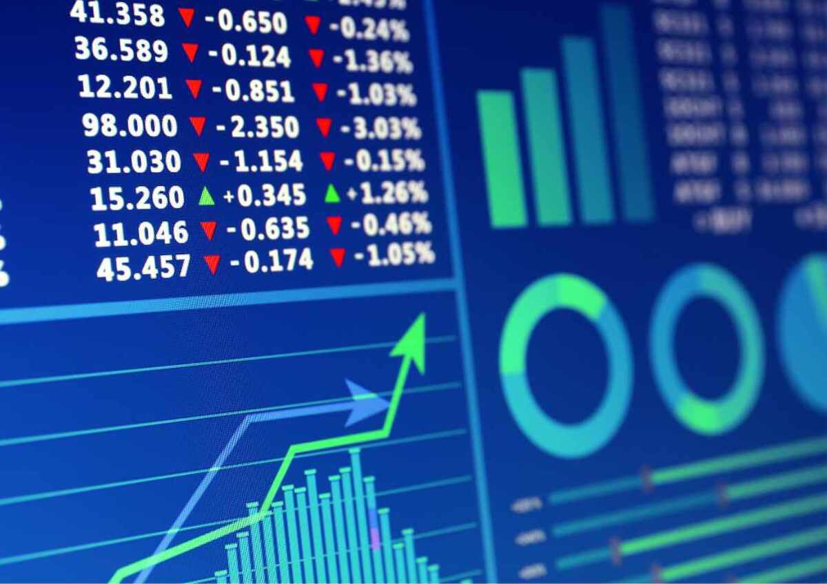 Stock market chart with upward trend and bar graphs.