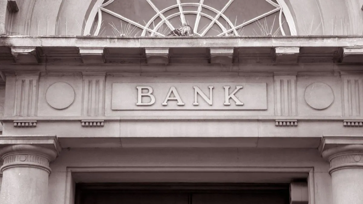 Bank Sign over Entrance Door in Black and White Sepia Tone