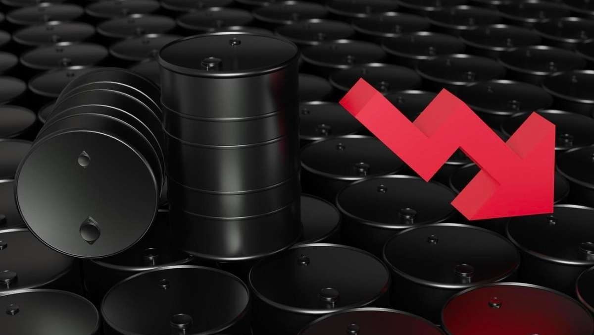 black oil drums with a red arrow pointing downward