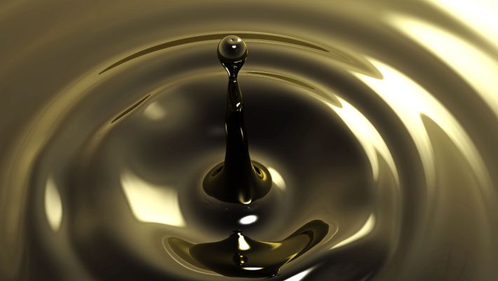 A pool of crude oil with ripples