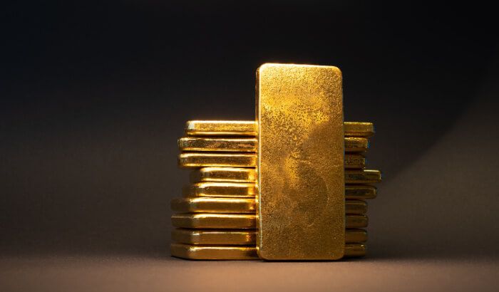 Gold price retreats on US dollar strength