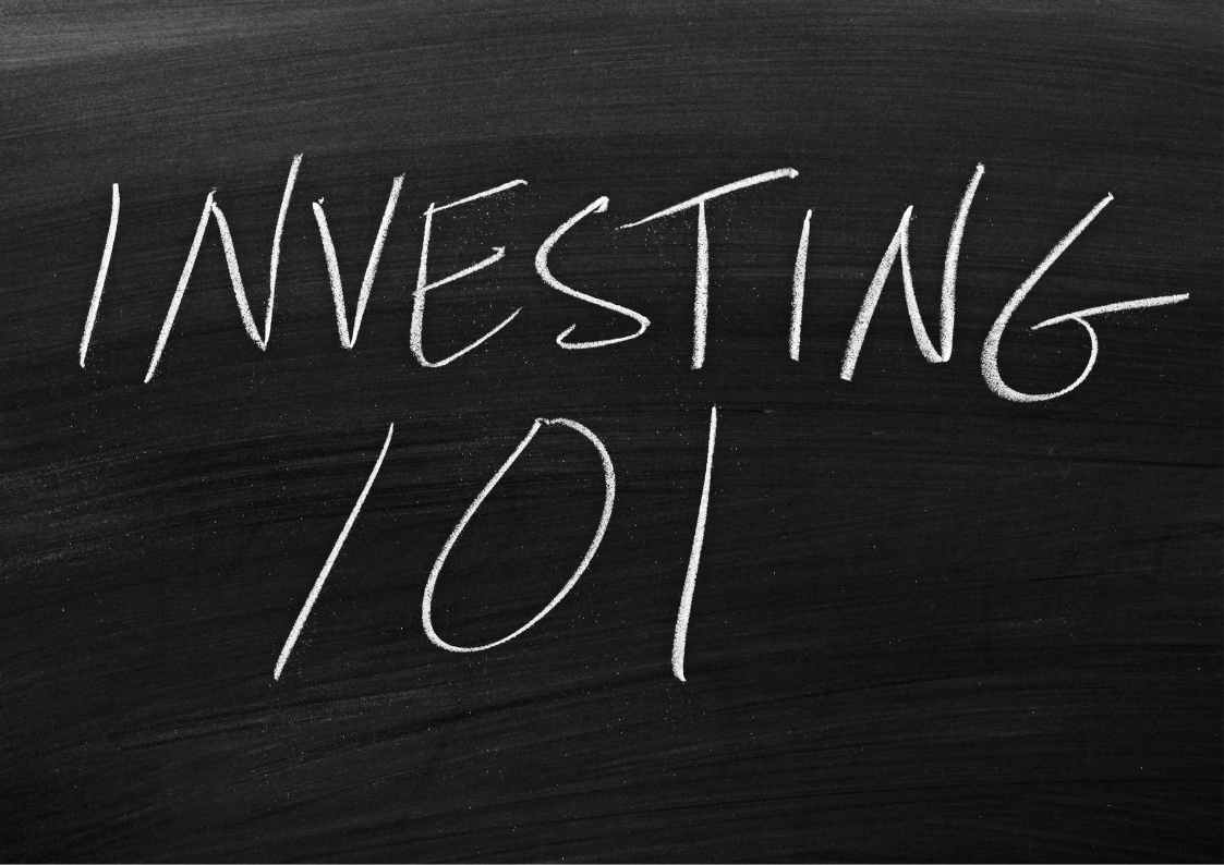 Blackboard with INVESTING 101 written in white chalk