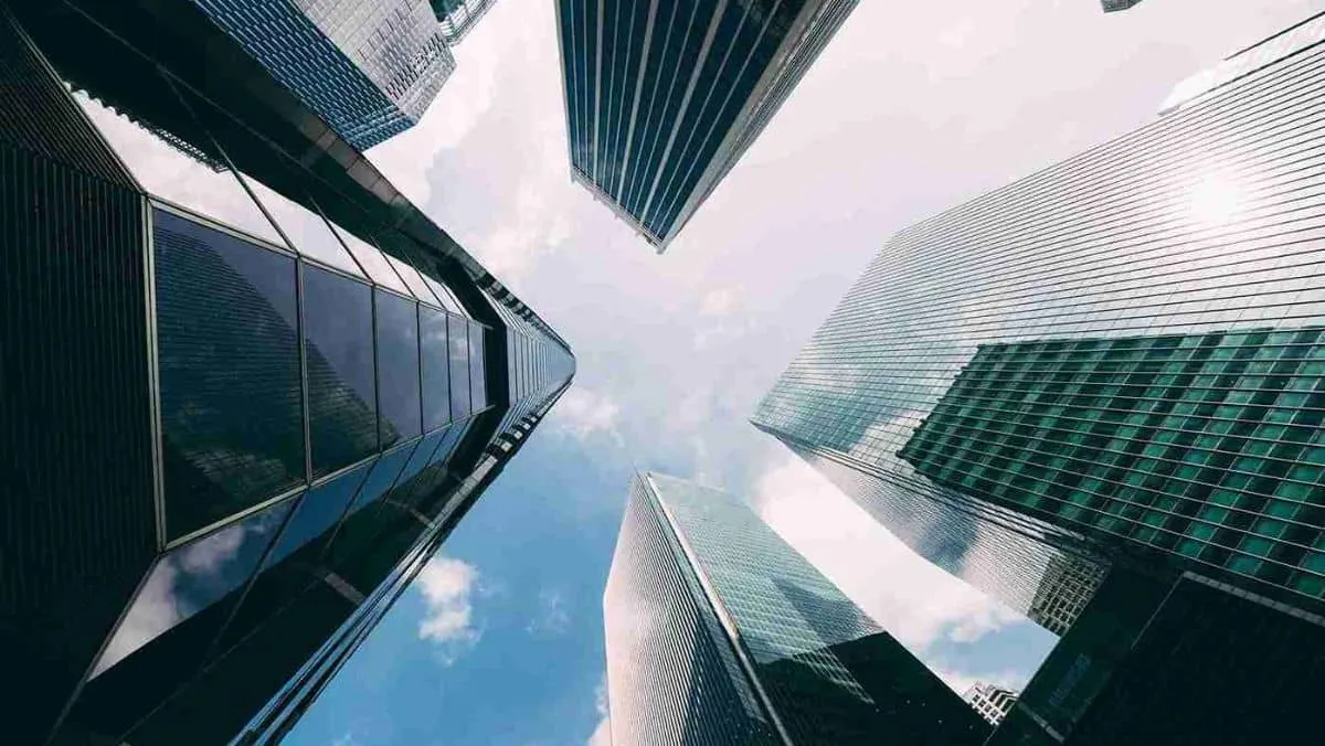 Low-angle perspective of the towering skyscrapers against the open sky