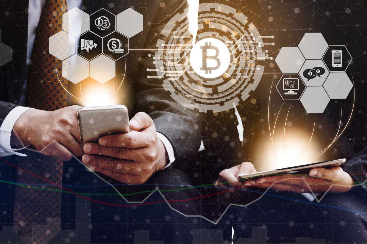 Man in suit using smartphone with Bitcoin and tech graphics overlay