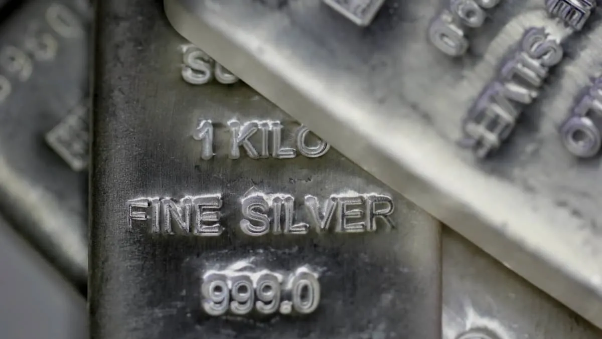 Close view revealing the fine details of silver bullion bars along with their respective labels