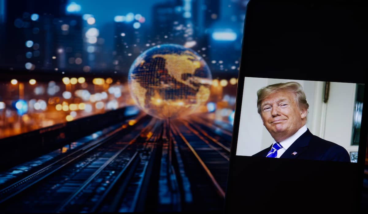 Trump tariffs impact on global economy displayed on smartphone screen.