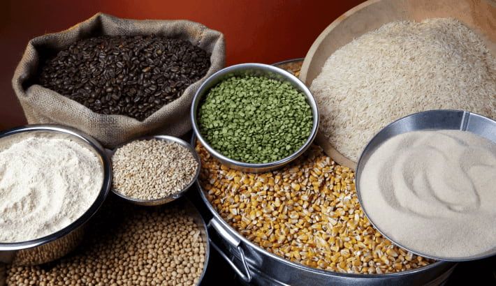 ssorted grains and legumes in burlap sacks showcasing a variety of colours and textures.