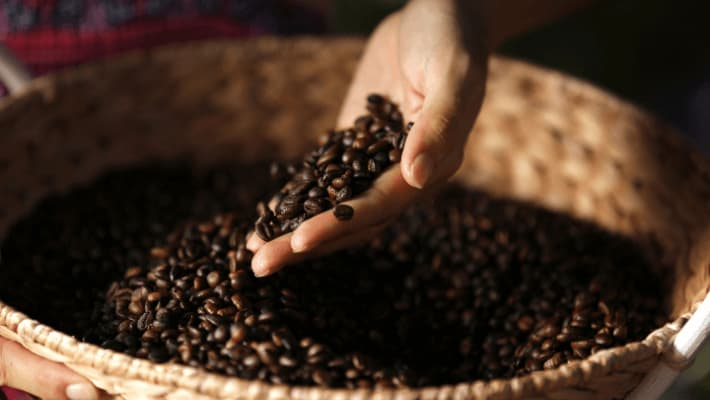 Coffee beans nestled in a basket