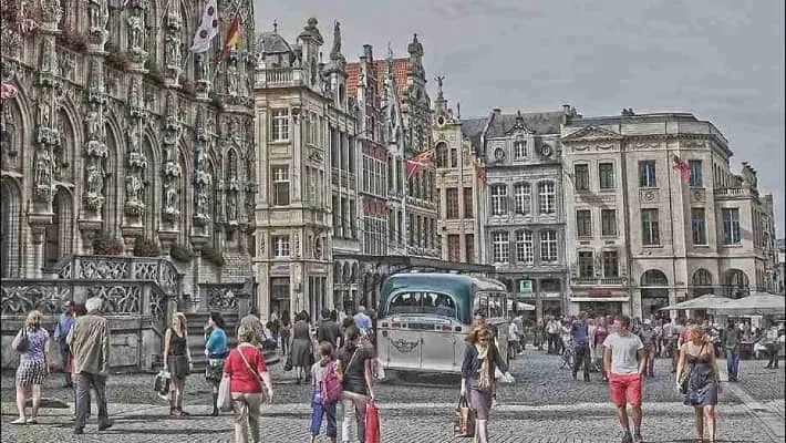 Crowded city street with a multitude of individuals going about their day