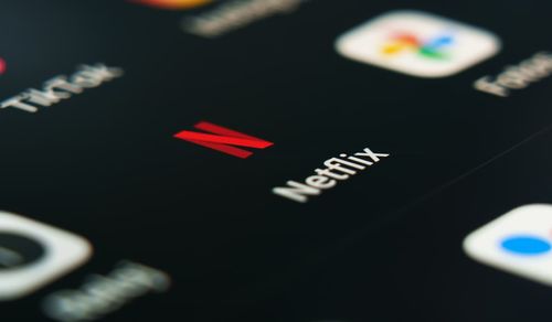 Netflix app logo on smartphone, representing "do Netflix stocks stay good or bad."